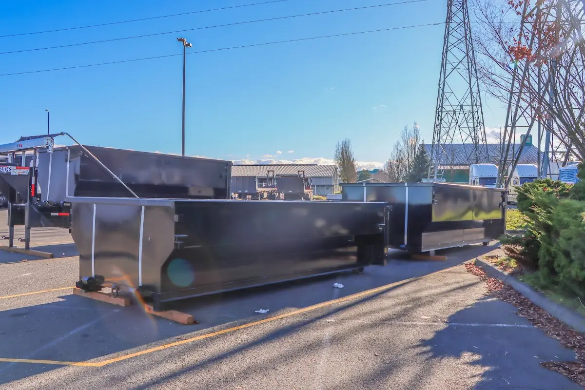 Roll-off dumpster ready for waste disposal at job site for 4 Yard Dumpster Rental in Blackwell